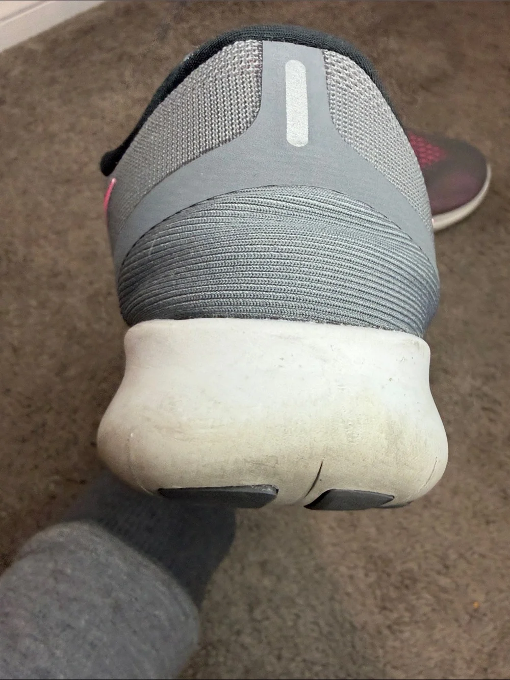 Nike Gray Athletic Sneakers with Pink Swoosh